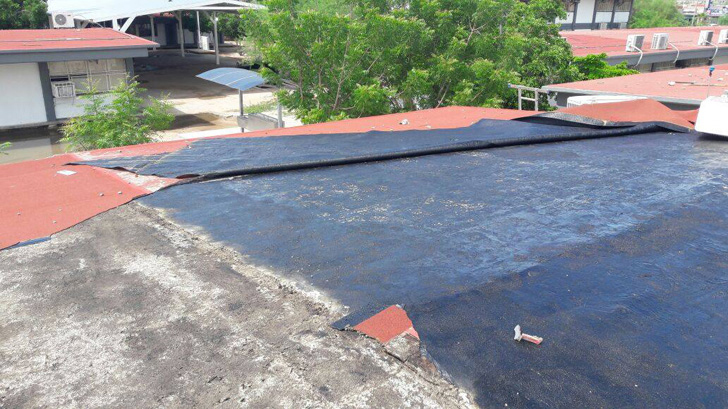 escuela techo reparar