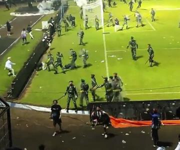 Disturbios en partido de fútbol en indonesia deja 127 muertos