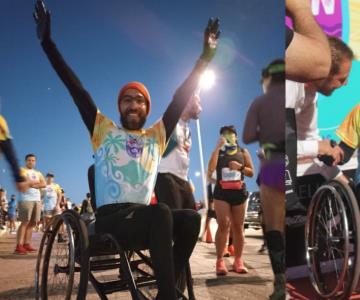 En su silla de ruedas, corre maratones para motivar sin palabras