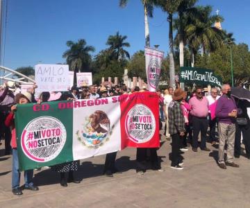 Acuden cientos de cajemenses a marcha en defensa del INE