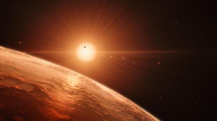 Hallan sistema solar con siete Tierras que podrían albergar vida