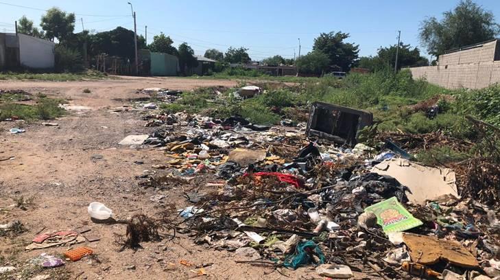 AUDIO | Lote baldío frente a escuela en la Unión de Ladrilleros es usado como basurón clandestino