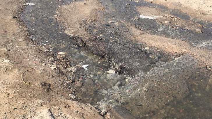 GALERÍA | Fuga de drenaje provoca malos olores en el fraccionamiento Romanza