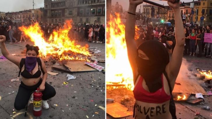 Mujeres bailan alrededor de fogata en el Zócalo tras marcha