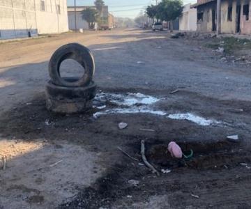 Colonia Zona: vecinos colocan llantas en las calles debido a su mal estado