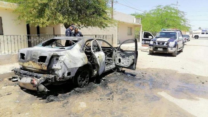 Incendian vehículos en respuesta a cateo en domicilio de Caborca